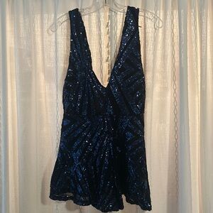 Black and blue sequin romper. Open back